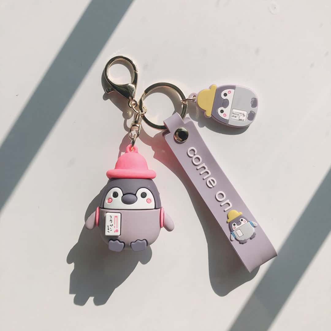 Baby Penguin wearing Cap with Strap and Bag charm